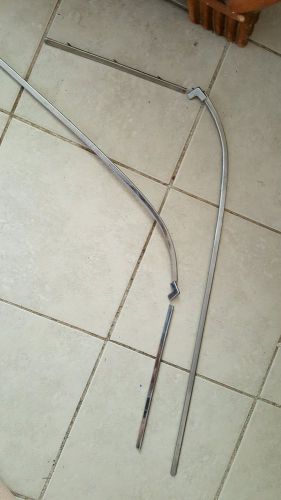 Set of 2 interior front door chrome trim for a 1957 chevy