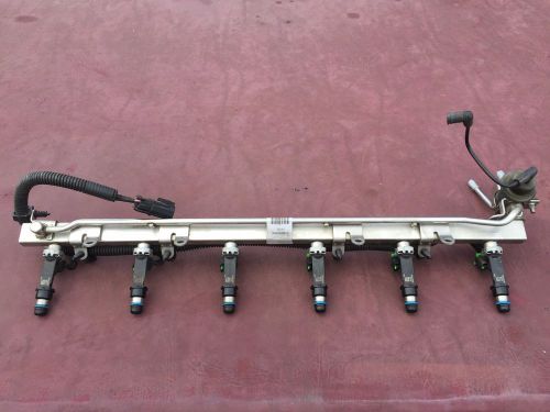 Oem 04 05 chevrolet trailblazer fuel rail with injectors 4.2l (fits: 2004