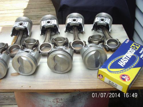 Chevy 283 v8  .030 over new dome pistons 7 recondistioned rods pins rings 57
