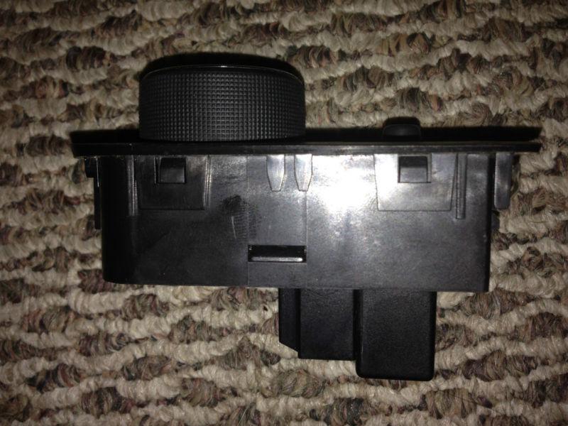 Buy 20052010 Chevy Impala Headlight, trunk switch button. Works in