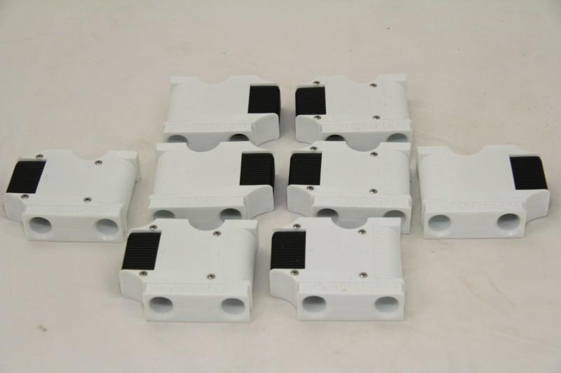 Eight fendergrip brand line fender adjusters, plus 2 gimble mount drink holders