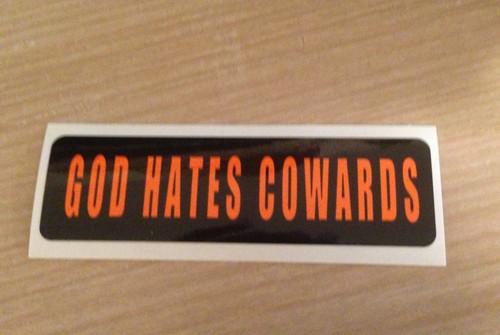 God hates cowards sticker
