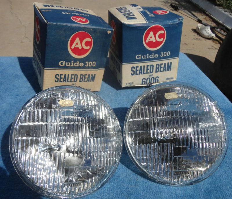 1941 1953 chevy pontiac oldsmobile cadillac buick nos ac guide t 3 headlights