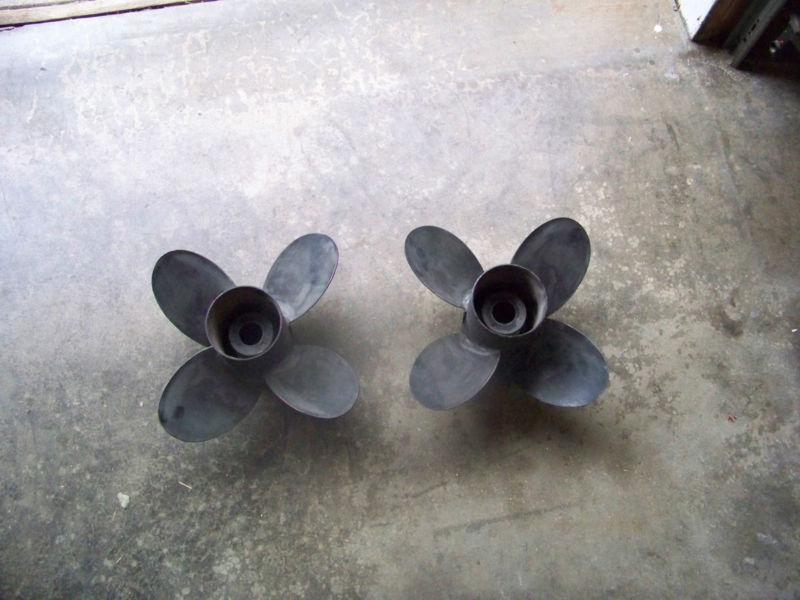 Used quicksilver diamond 4 blade 15 x 16 boat propellers, aluminum, lh and rh