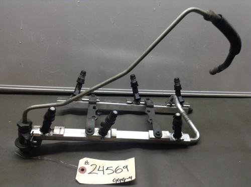 Buick 3.1/3.4l engine fuel rail w/injectors (25323971)(17200901)(ggg-4) #f24569