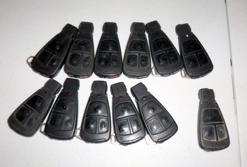 Lot of 12 assorted mercedes benz smart key keyless remotes fobs transmitters