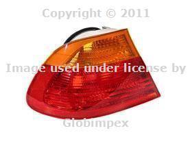 Bmw e46 (00-03) fender tail light +yellow left oem + 1 year warranty