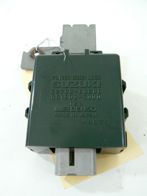 99-04 suzuki vitara chevy tracker power door lock module 38700-60g00-oem