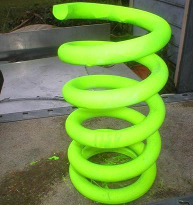 Front spring 1350# 5" dia. 9" height, ground flat one end nascar imca racing