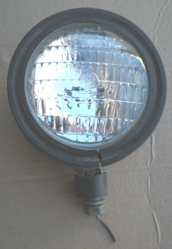 1 – vintage stewart warner 4" fog/driving light w/ mount - used