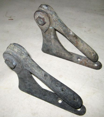 One pair of vintage chris craft helm foot rest brackets