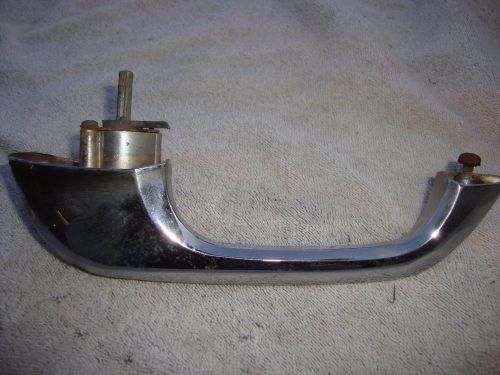 Used. 1960 ford country sedan 4 dr. right front exterior door handle