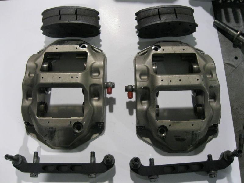 Performance friction 6 piston brake calipers with pads and radial mounts