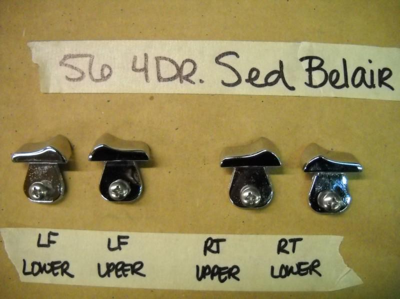 56 chevy belair 4 door sedan side body molding center clip connector molding