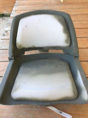 Fold down cushioned boat seat