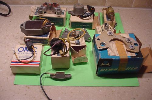 Evinrude johnson large lot (11)  n.o.s. vintage ignition-electrical items boxed.