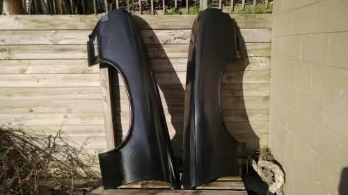 1970-72 cutlass 442 new gm nos fenders 404718/404719 pair  gm original parts!