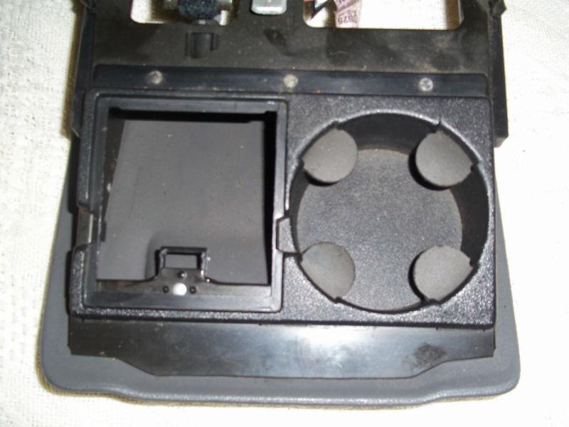 1999 pontiac bonneville dash ashtray/cup holder with bracket and light. nice!!!