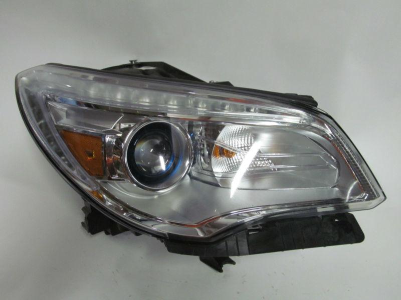Sell 2013 GMC ENCLAVE OEM RIGHT XENON HEADLIGHT NICE! in Flat Rock