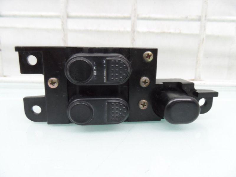 Master door window switch panel chrysler laser 1993