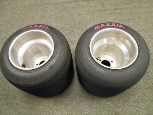 2 maxxis pinks12x9.00x6 on silver wheels.kart,drift trike,wagons,barstools etc.