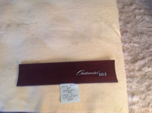 Wood trim and emblem