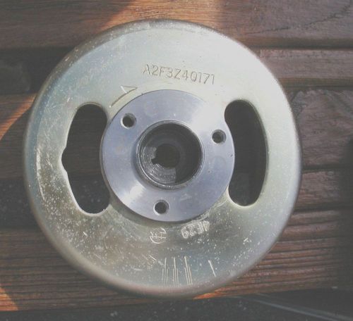 Used omc outboard fly wheel 115718  fits 2 / 2.3 / 3.3 / 3.5 omc 1995 - up