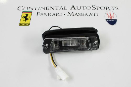 Oem maserati coupe/gransport/gran turismo  license plate light assembly  198231