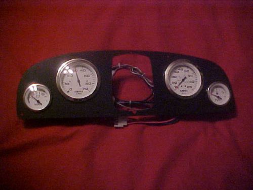 New 4 pc teleflex gauge set, tac, volt, fuel and 65 mph speedo, mercury, wired.