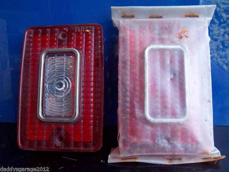 1979 chevy wagon. 1-nos, 1 oem, tail light lens. pair