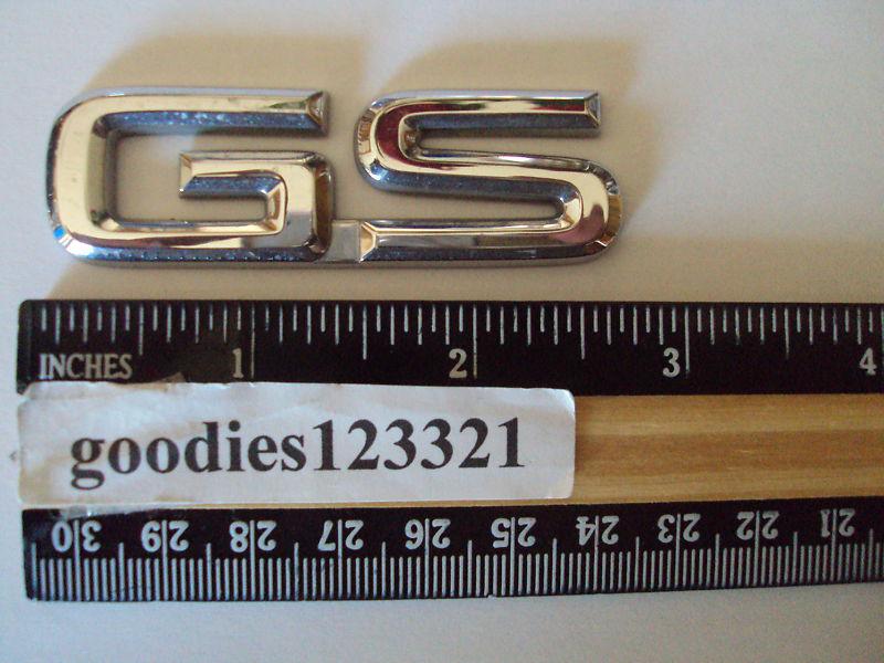 Mercury gs chrome emblem used  2 3/4" x  3/4"