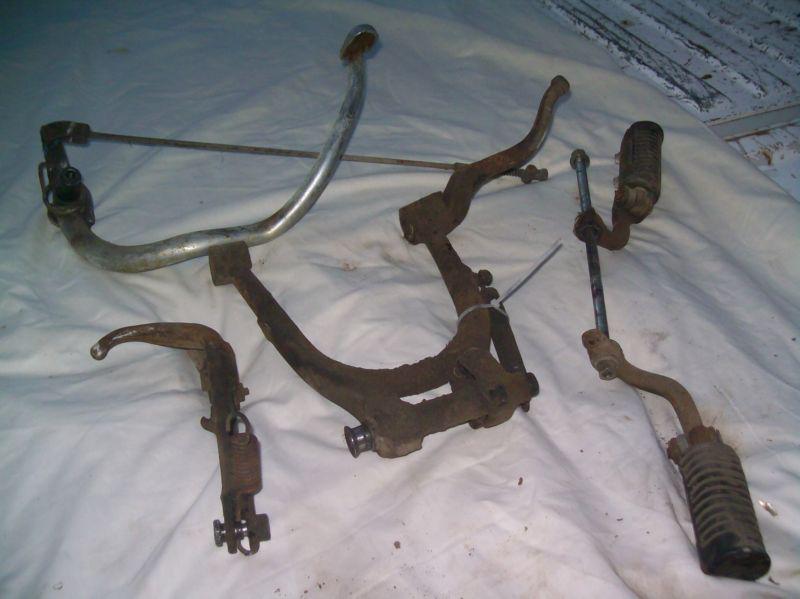 75 honda cb 360 foot pegs & kick stands & break pedal!!!  ( look free shipping)