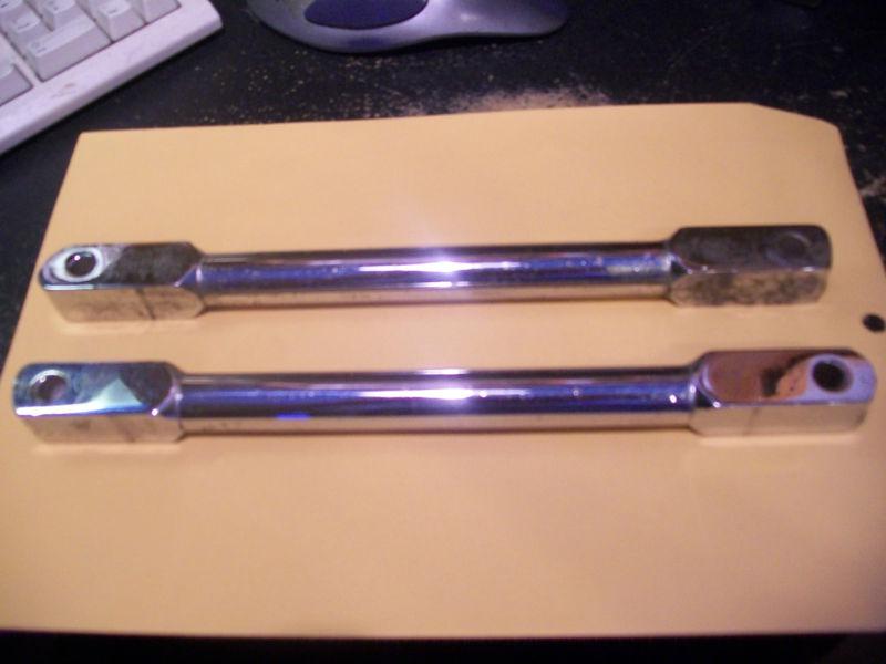 Chrome rigid rear struts. were on an old triumph bonneville. may fit others