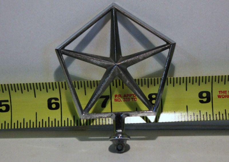 Old car emblem chrysler  removed from junked car many years ago