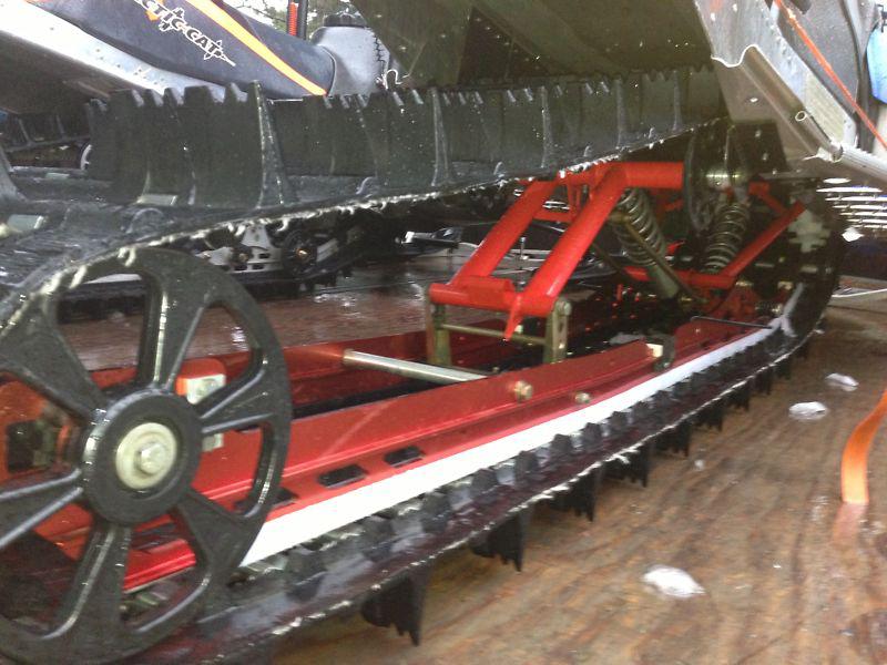 174" holz skid off polaris dragon rmk with 174" camo extreme track 2.5" lugs