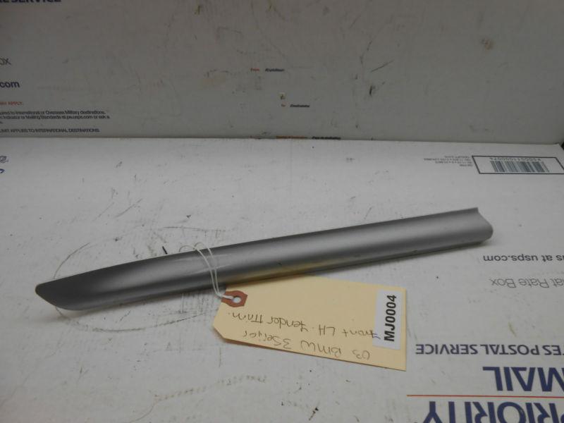 03 bmw 3 series driver side fender trim  mj0004