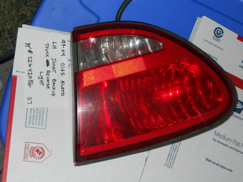 99 00 01 02 03 04 olds alero rh side trunk lid tail light rev bac 22642086