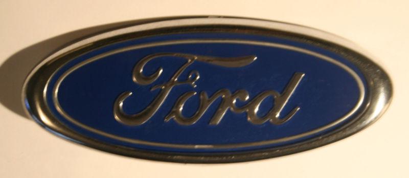 Nice chrome and blue plastic ford emblem 
