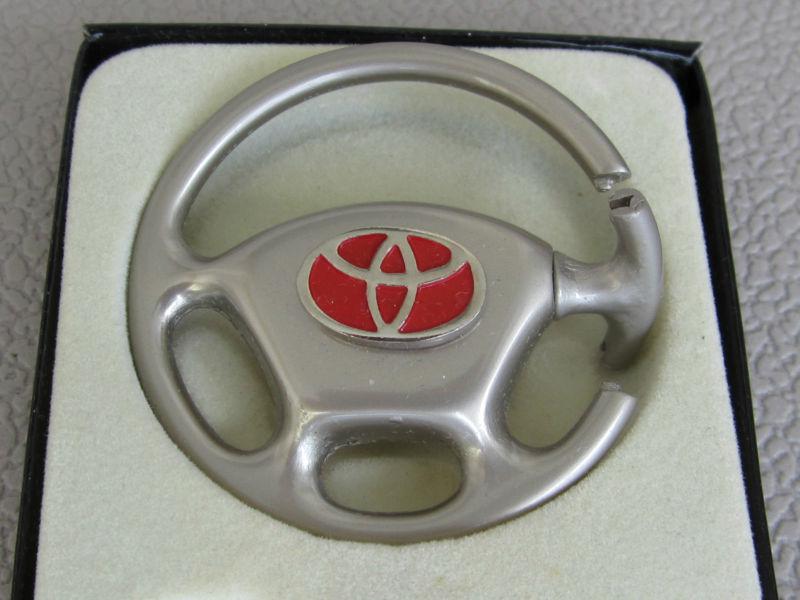 Metal toyota  mini steering wheel keychain ( last one )