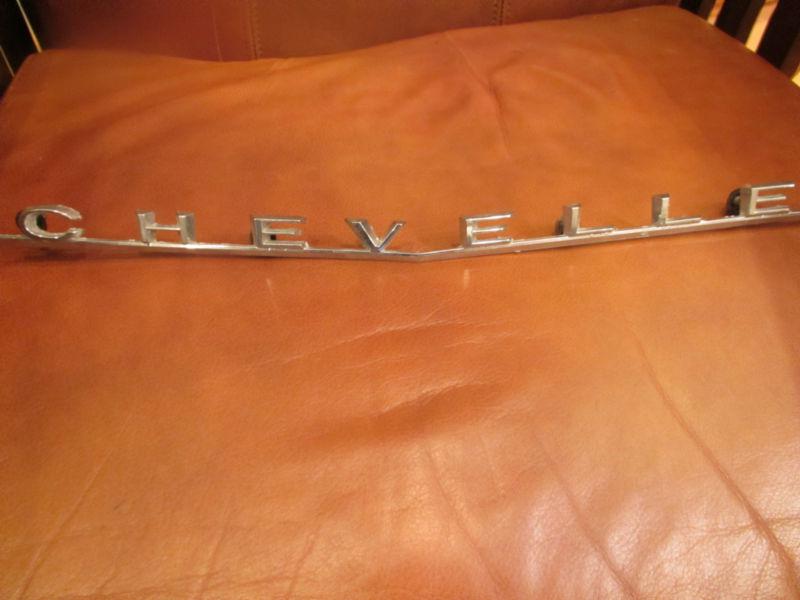 Trim parts 66 chevelle ss rear panel emblem oem