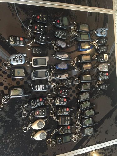 Lot of 47 pre-owned remote starter fobs