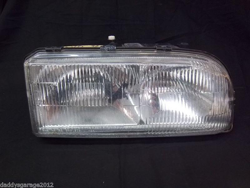 92 volvo s series. rh headlight assembly