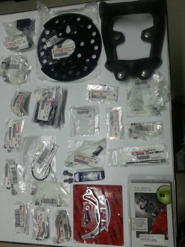 Raptor 700 front wheel tapered roller bearing conversion kit tusk chain saver