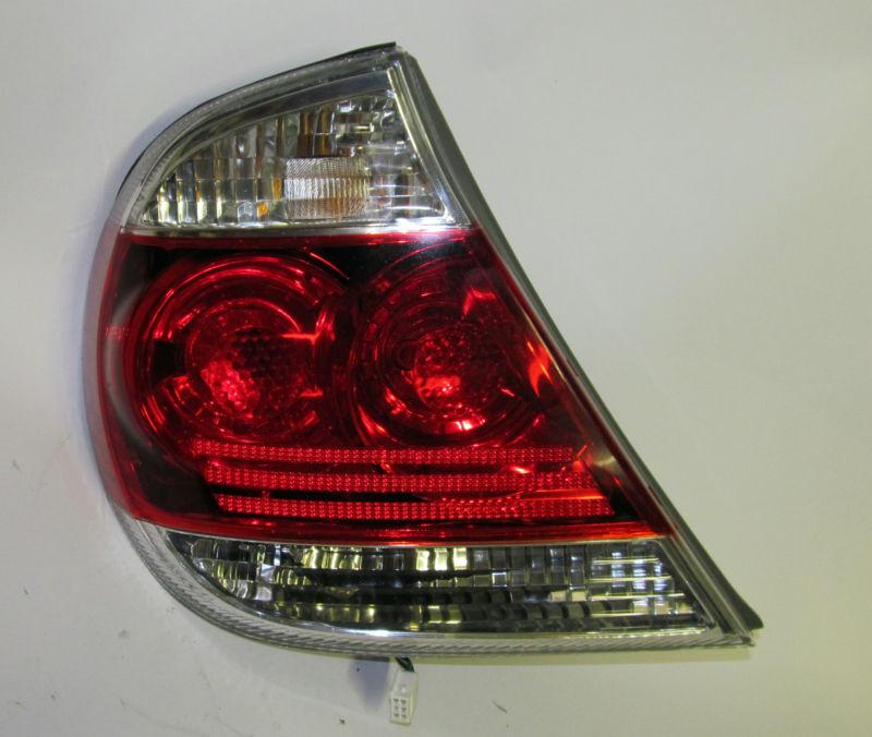 05 06 toyota camry oem left tail light nice!