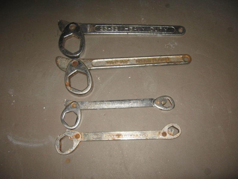 4 used multi wrenches - all work
