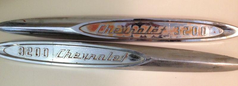 1957 chevy truck front fender emblems 3200 chevrolet script original