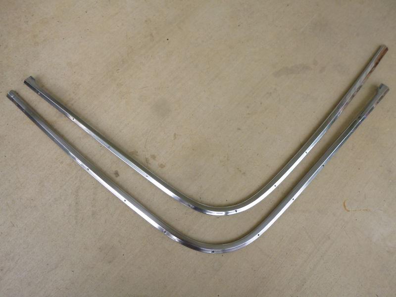 1961-1964 chevrolet impala convertible , pinchweld moldings ( need repaired )