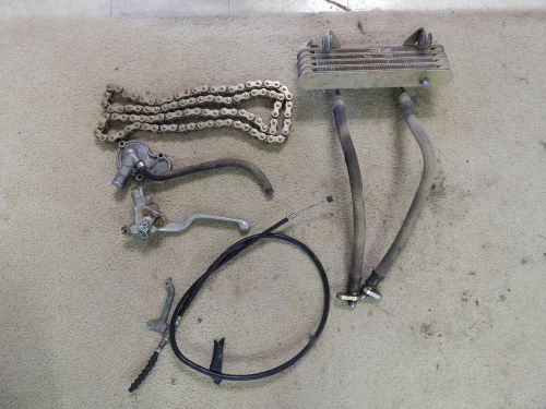 Honda trx 450 parts lot clutch cable, oil cooler, chain, brake lever misc oem