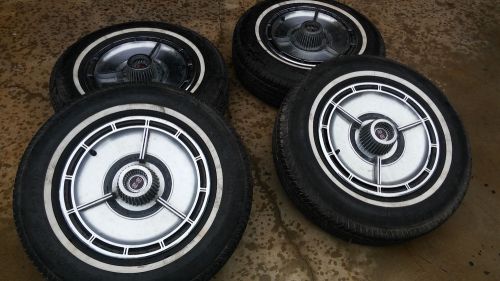 1964 chevelless malibu 14&#034; wheels and tires , nice original hub caps