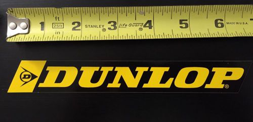 Dunlop yellow lettering black background sticker